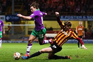 Images Dated 14th April 2015: Intense Battle: Ben Williams Tackles Luke Freeman in Bradford City vs. Bristol City Football Match