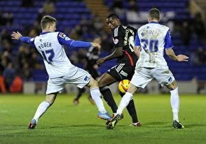 Images Dated 16th November 2013: Intense Battle: Jay Emmanuel-Thomas Fights for Ball in Sky Bet League One Clash vs. Tranmere