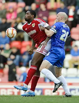 Bristol City V Gillingham Prints: Intense Battle: Jay Emmanuel-Thomas vs Adam Barrett - Sky Bet League One Clash at Ashton Gate (01)