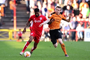 Intense Battle for Possession: Mark Little vs. Jon Dadi Bodvarsson in Bristol City vs. Wolverhampton Wanderers