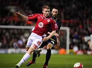 Bristol City V Barnsley Prints: Intense Championship Clash: Ribeiro vs Bogdanovic's Battle for Supremacy