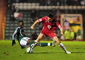 Bristol City V Plymouth Argyle Prints: Intense Championship Showdown: Bradley Orr vs Yannick Bolasie