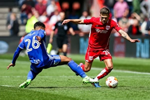 Intense Championship Showdown: Jamie Paterson vs. David Davis at Ashton Gate