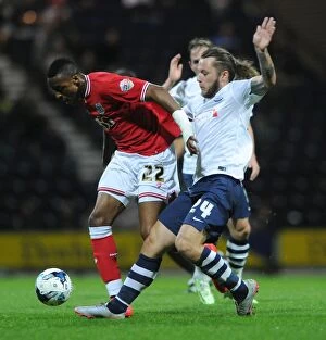 Images Dated 15th September 2015: Intense Championship Showdown: Kodjia vs May at Deepdale Stadium