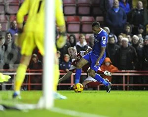 Images Dated 2nd November 2013: Intense Collision: Wagstaff vs Montano, Bristol City vs Oldham Athletic