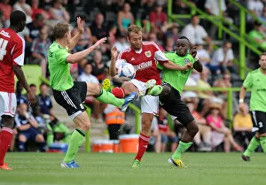 Images Dated 20th July 2013: Intense Football Rivalry: Liam Kelly vs. Yan Klukowski and Alhassan Bangura - Forest Green Rovers