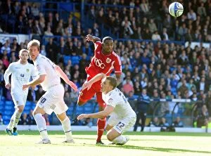 Images Dated 17th September 2011: Intense League Cup Showdown: Marvin Elliott vs. Becchio and Somma (Leeds United vs. Bristol City)