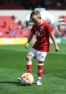 Intense Moment at Ashton Gate: Bristol City Mascot Amidst the Sky Bet Championship Action
