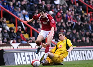 Framed Print : Intense Moment: A Clash Between Sproule and the Action – Bristol City vs Plymouth Argyle