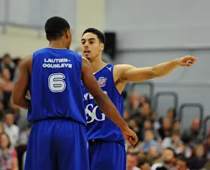 Intense Moment: Coach Roy Owen and Dwayne Lautier-Ogunleye of the Bristol Flyers During Basketball Match against Newcastle Eagles