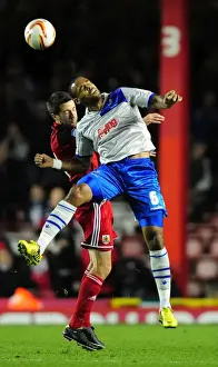 Intense Moment: Cole Skuse vs. Liam Trotter - A Head-to-Head Battle in Bristol City vs. Millwall Championship Match