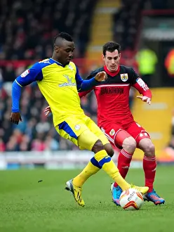 Bristol City V Sheffield Wednesday Prints: Intense Moment: Gregg Cunningham Chases Down Jermaine Johnson during Bristol City vs Sheffield Wednesday