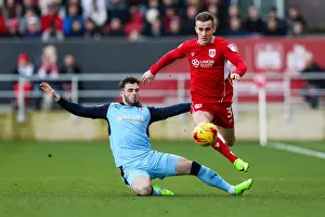 Bristol City V Rotherham United Prints: Intense Moment: Joe Bryan vs. Anthony Forde - A Hard-Fought Tackle in Bristol City vs