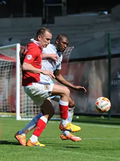 Title Prints: Intense Moment: Wilbraham Fights Off Johnson's Pressure during Bristol City vs Coventry City Football Match