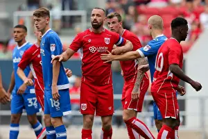 Bristol City V Portsmouth Prints: Intense Moment: Wilbraham's Focus Amidst Pre-Season Rivalry (Bristol City vs Portsmouth)