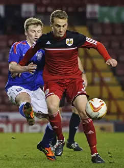 Bristol City U21s Prints: Intense Moment: Young Star Cline's Battle in FA Youth Cup Third Round Proper at Ashton Gate Stadium
