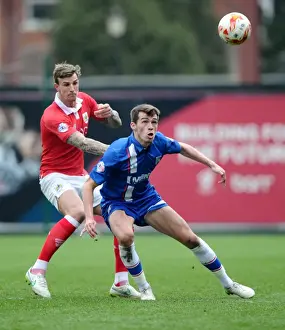 Gillingham Prints: Intense Rivalry: Aden Flint vs John Marquis in the Heart of the Bristol City vs Gillingham Clash