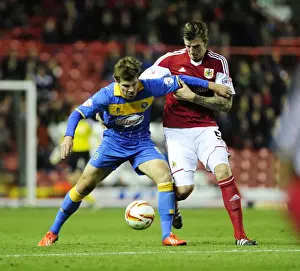 Bristol City V Shrewsbury Town Prints: Intense Rivalry: Aden Flint vs Tom Bradshaw - Battle for Ball Possession