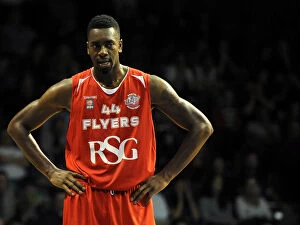 Images Dated 31st October 2014: Intense Rivalry: Alif Bland of the Bristol Flyers Faces Off Against Worcester Wolves in British
