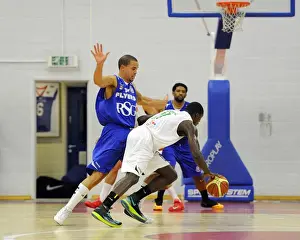 Bristol Flyers V Plymouth Raiders Prints: Intense Rivalry on the Basketball Court: McLaughlin-Williams vs
