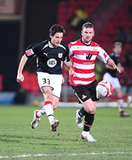 Doncaster Rovers V Bristol City Collection: The Intense Rivalry: Bristol City vs. Doncaster Rovers (08-09 Season) - A Football Showdown