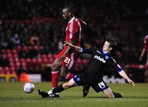 Bristol City v Portsmouth Collection: Intense Rivalry: Cisse vs. Hogg in the Championship Clash between Bristol City