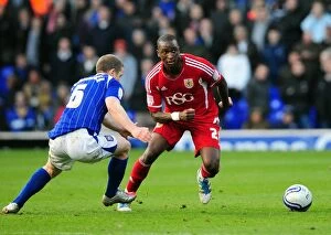 Ipswich Town v Bristol City Collection: Intense Rivalry: Cisse vs Leadbitter in the Heart of the Football Battle at Portman Road, 2012