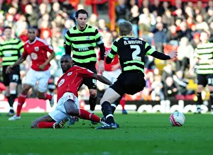 Bristol City V Scunthorpe United Prints: Intense Rivalry: Cisse vs. Wright - Championship Battle at Ashton Gate, 2010