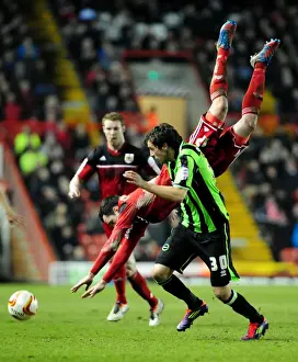 Intense Rivalry: Cunningham vs Buckley - A Football Battle at Ashton Gate