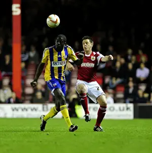 Bristol City V Brentford Prints: Intense Rivalry: Donaldson vs. Shorey - Battle for Possession