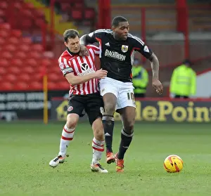 Sheffield United V Bristol City Prints: Intense Rivalry: Doyle vs Emmanuel-Thomas Battle for Supremacy in Sheffield United vs Bristol City Clash