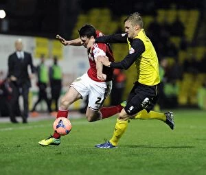 Images Dated 14th January 2014: Intense Rivalry: Ekstrand vs. Moloney's Battle for the Ball in FA Cup Replay