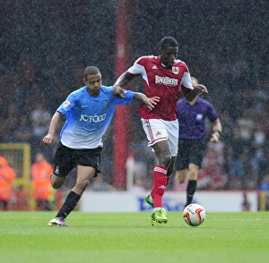 Bristol City V Bradford City Prints: Intense Rivalry: Emmanuel-Thomas vs Meredith, Bristol City vs Bradford City