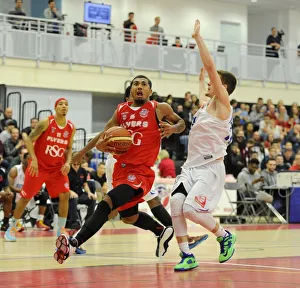 Intense Rivalry: Flyers vs. United at SGS Wise Campus (November 2014) - A Basketball Showdown - Bristol Flyers and Surrey United Go Head-to-Head