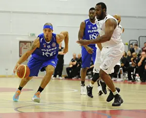 Bristol Flyers V Newcastle Eagles Prints: Intense Rivalry: Flyers vs. Eagles Basketball Showdown at SGS Wise Campus