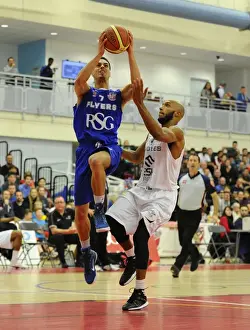 Intense Rivalry: Flyers vs. Eagles Basketball Showdown at SGS Wise Campus (November 2014)