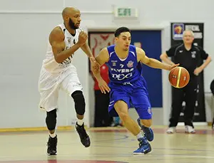 Intense Rivalry: Flyers vs. Eagles Basketball Showdown at SGS Wise Campus (November 2014)
