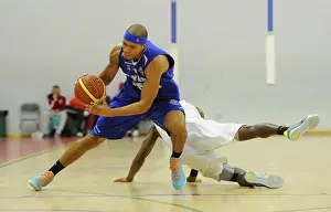 Intense Rivalry: Flyers vs. Eagles Basketball Showdown at SGS Wise Campus (November 2014)