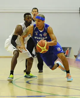 Intense Rivalry: Flyers vs. Eagles Basketball Showdown at SGS Wise Campus (November 2014)