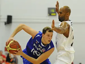 Intense Rivalry: Flyers vs. Eagles Basketball Showdown at SGS Wise Campus (November 2014)