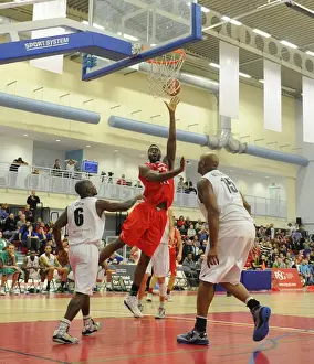 Bristol Flyers V Manchester Giants Prints: Intense Rivalry: Flyers vs. Giants Basketball Showdown