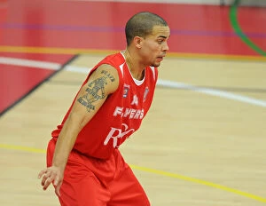 Images Dated 11th October 2014: Intense Rivalry: Flyers vs. Raiders in British Basketball Cup at Wise Campus