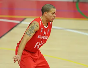 Bristol Flyers V Plymouth Raiders BBL Cup Prints: Intense Rivalry: Flyers vs. Raiders in British Basketball Cup at Wise Campus
