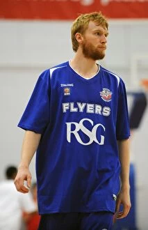 Images Dated 27th September 2014: Intense Rivalry: Flyers vs. Raiders - Mathias Seilund's Focus during the Basketball Clash