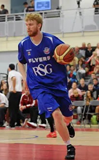 Bristol Flyers V Plymouth Raiders Prints: Intense Rivalry: Flyers vs. Raiders - Mathias Seilund's Focus during Basketball Match