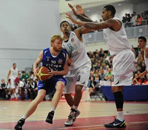 Bristol Flyers V Plymouth Raiders Prints: Intense Rivalry: Flyers vs. Raiders - Mathias Seilund's Focus during Bristol Academy Basketball Match