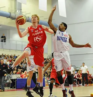 Intense Rivalry: Flyers vs. United Basketball Showdown at SGS Wise Campus (November 2014)