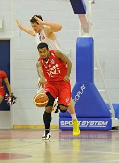 Bristol Flyers v Surrey United Collection: Intense Rivalry: Flyers vs. United at SGS Wise Campus (November 2014) - A Basketball Showdown