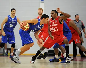 Bristol Flyers V Durham Wildcats Prints: Intense Rivalry: Flyers vs. Wildcats Showdown - Basketball Clash at SGS Wise Campus