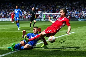 Bristol City V Birmingham City Prints: Intense Rivalry: A Hard-Fought Tackle between Joe Bryan